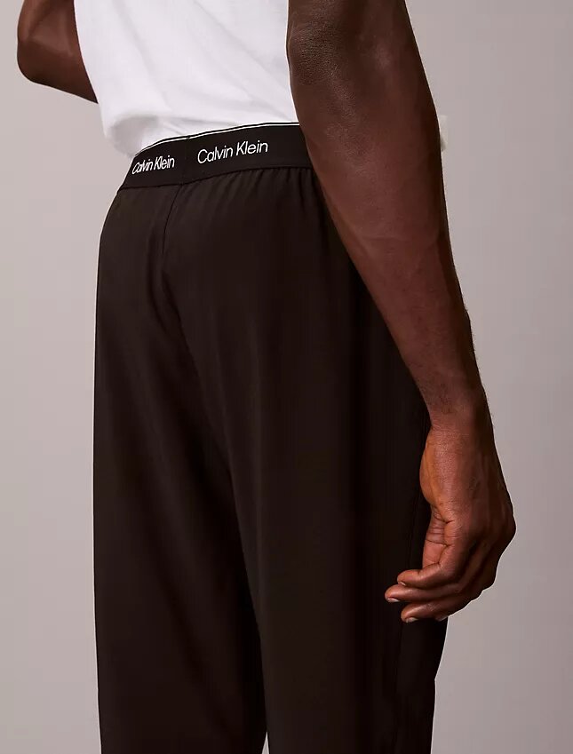 Modern Spor Logolu Bel Bandı Dokuma Pantolonlar Modern Spor Logolu Bel Bandı Dokuma Pantolonlar