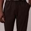 Modern Spor Logolu Bel Bandı Dokuma Pantolonlar Modern Spor Logolu Bel Bandı Dokuma Pantolonlar